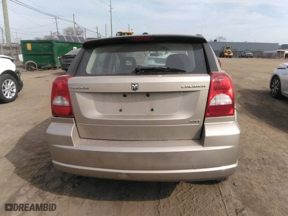 2009 Dodge Caliber SXT with VIN 1B3HB48A59D241061, listed as a IAAI auction lot 41801504 with 158,165 mi miles. Bid and sale history available at carsss.com. Image 16.