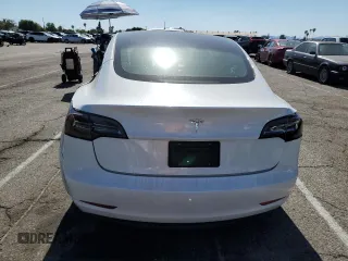 2023 Tesla Model 3 z VIN 5YJ3E1EA5PF401240, wystawiony jako Copart lot #56548895 z przebiegiem 25 188 mil mil oraz Szkoda całkowita • Salvage title. Historia ofert i sprzedaży dostępna na DreamBid. Obrazek 6.