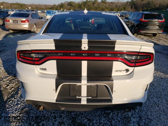 2023 Dodge Charger SRT Hellcat Redeye Widebody with VIN 2C3CDXL92PH630519, listed as a Copart auction lot 83360544 with 12,389 mi miles and Salvage Title. Bid and sale history available at DreamBid. Image 6.
