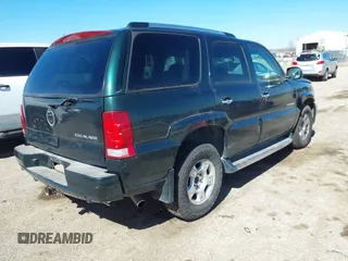 2003 Cadillac Escalade z VIN 1GYEK63N83R123971, wystawiony jako IAAI lot #41814808 z przebiegiem 235 724 mil mil oraz . Historia ofert i sprzedaży dostępna na DreamBid. Obrazek 4.