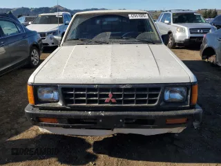 1990 Mitsubishi Mighty Max z VIN JA7FL24W3LP007688, wystawiony jako Copart lot #42651005 z przebiegiem 265 379 mil mil oraz Tytuł czysty. Historia ofert i sprzedaży dostępna na DreamBid. Obrazek 5.