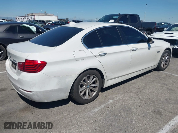 2014 BMW 5 Series 528i with VIN WBA5A5C55ED500014, listed as a IAAI auction lot 41835309 with 114,436 mi miles and . Bid and sale history available at DreamBid. Image 4.
