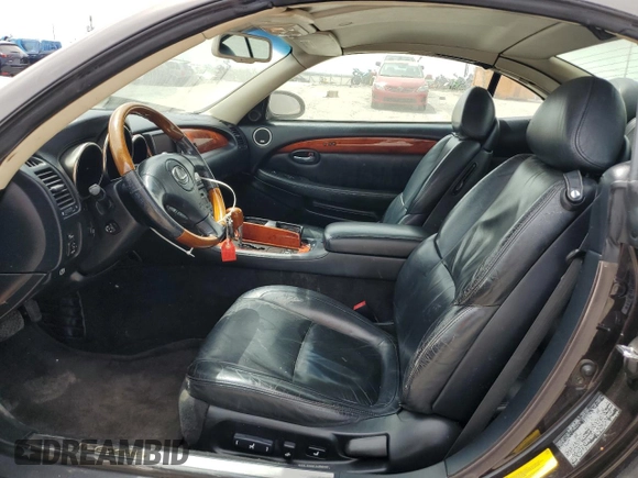 2002 Lexus SC 430 z VIN JTHFN48Y820017434, wystawiony jako Copart lot #56757195 z przebiegiem 148 382 mil mil oraz Szkoda całkowita • Salvage title. Historia ofert i sprzedaży dostępna na DreamBid. Obrazek 7.