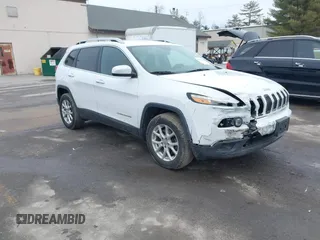 2016 Jeep Cherokee Latitude with VIN 1C4PJMCB5GW324973, listed as a IAAI auction lot 41614882 with 135,071 mi miles and . Bid and sale history available at DreamBid. Image 1.