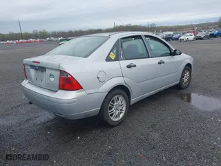 2007 Ford Focus S with VIN 1FAHP34N47W261179, listed as a IAAI auction lot 41931042 with 216,400 mi miles. Bid and sale history available at carsss.com. Image 4.