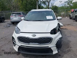 2021 Kia Sportage EX with VIN KNDPN3AC5M7856515, listed as a IAAI auction lot 41879128 with 56,537 mi miles and . Bid and sale history available at DreamBid. Image 12.