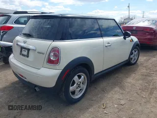 2011 MINI Hardtop with VIN WMWSU3C58BT184415, listed as a IAAI auction lot 41891353 with 149,533 mi miles and . Bid and sale history available at DreamBid. Image 4.