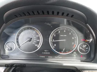 2015 BMW 5 Series 528i with VIN WBA5A5C57FD512845, listed as a IAAI auction lot 41954256 with 174,944 mi miles. Bid and sale history available at carsss.com. Image 7.