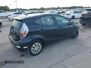 2012 Toyota Prius One with VIN JTDKDTB35C1511112, listed as a IAAI auction lot 41074047 with 156,510 mi miles and . Bid and sale history available at DreamBid. Image 4.