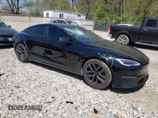 2021 Tesla Model S Plaid with VIN 5YJSA1E63MF451391, listed as a Copart auction lot 54821985 with 50,480 mi miles and Salvage title. Bid and sale history available at DreamBid. Image 4.