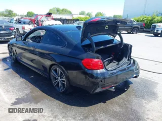 2015 BMW 4 Series 435i with VIN WBA3R1C56FK194060, listed as a IAAI auction lot 42061619 with 153,384 mi miles and . Bid and sale history available at DreamBid. Image 3.