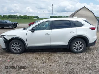 2016 Mazda CX-9 Sport with VIN JM3TCABY4G0100620, listed as a IAAI auction lot 42316216 with 191,245 mi miles and . Bid and sale history available at DreamBid. Image 14.