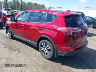 2018 Toyota RAV4 LE with VIN JTMBFREV2JD228186, listed as a IAAI auction lot 42076730 with 93,899 mi miles. Bid and sale history available at carsss.com. Image 3.