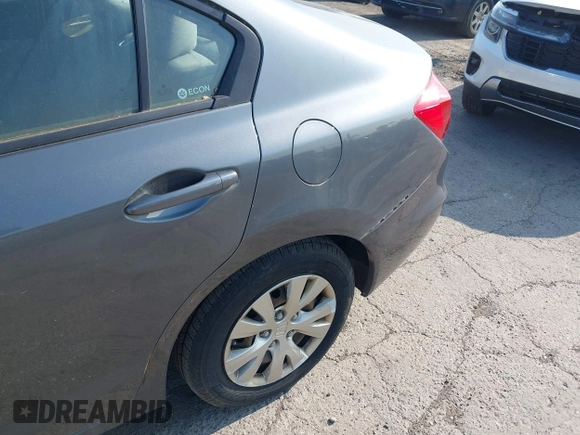 2012 Honda Civic LX z VIN 19XFB2F58CE102273, wystawiony jako IAAI lot #42409158 z przebiegiem 178 381 mil mil oraz . Historia ofert i sprzedaży dostępna na DreamBid. Obrazek 12.