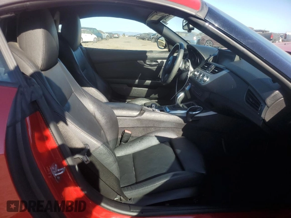 2012 BMW Z4 sDrive35is with VIN WBALM1C58CE633610, listed as a Copart auction lot 42824955 with 84,901 mi miles and Salvage title. Bid and sale history available at DreamBid. Image 10.