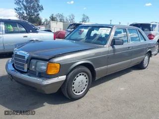 1991 Mercedes-Benz 420 Series 420SEL with VIN WDBCA35E0MA580834, listed as a IAAI auction lot 41949794 with 30,413 mi miles. Bid and sale history available at carsss.com. Image 2.