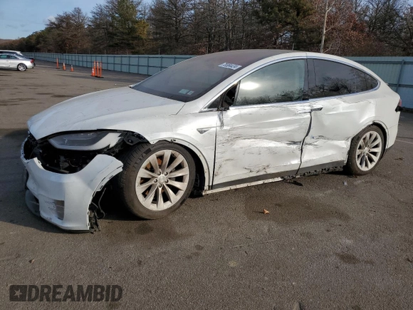 2016 Tesla Model X 70D z VIN 5YJXCBE27GF018468, wystawiony jako Copart lot #78384424 z przebiegiem 108 856 mil mil oraz Nie do naprawy • Non repairable. Historia ofert i sprzedaży dostępna na DreamBid. Obrazek 1.