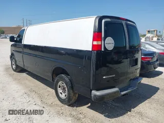 2005 Chevrolet Express Cargo Van with VIN 1GCGG29VX51196213, listed as a IAAI auction lot 41897062 with 417,674 mi miles. Bid and sale history available at carsss.com. Image 3.