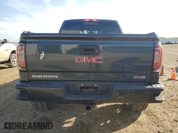 2017 GMC Sierra 1500 SLT z VIN 3GTU2NEC4HG518549, wystawiony jako Copart lot #56894335 z przebiegiem 127 021 mil mil oraz Tytuł czysty. Historia ofert i sprzedaży dostępna na DreamBid. Obrazek 6.