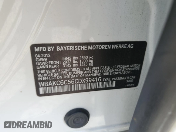 2012 BMW 7 Series 750i xDrive with VIN WBAKC6C56CDX99416, listed as a Copart auction lot 54857715 with 114,198 mi miles and Salvage Title. Bid and sale history available at DreamBid. Image 12.