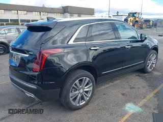 2024 Cadillac XT5 FWD Premium Luxury with VIN 1GYKNCRS6RZ745077, listed as a IAAI auction lot 41247248 with 3,302 mi miles. Bid and sale history available at carsss.com. Image 4.