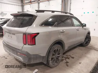 2023 Kia Sorento SX z VIN 5XYRKDLF0PG189570, wystawiony jako IAAI lot #41587404 z przebiegiem 22 006 mil mil oraz . Historia ofert i sprzedaży dostępna na DreamBid. Obrazek 4.