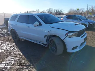 2018 Dodge Durango SRT with VIN 1C4SDJGJ7JC416340, listed as a IAAI auction lot 41624742 with 116,475 mi miles and . Bid and sale history available at carsss.com. Image 1.
