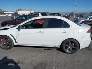 2012 Mitsubishi Lancer Evolution MR with VIN JA32W5FV3CU009679, listed as a IAAI auction lot 40787549 with 167,206 mi miles. Bid and sale history available at carsss.com. Image 15.