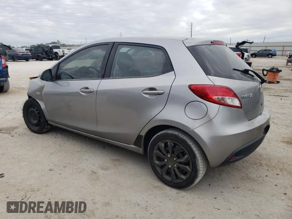 2012 Mazda 2 Sport with VIN JM1DE1KY1C0140803, listed as a Copart auction lot 83420714 with 153,730 mi miles and Salvage Title. Bid and sale history available at DreamBid. Image 2.