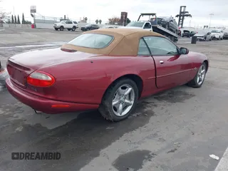 1997 Jaguar XK with VIN SAJGX2745VC017589, listed as a IAAI auction lot 42208129 with Not Provided miles and . Bid and sale history available at DreamBid. Image 4.