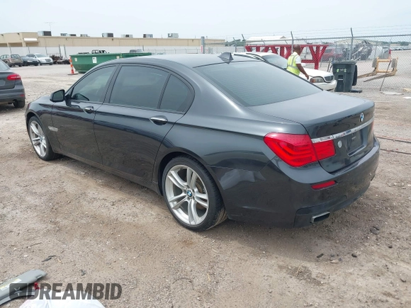 2011 BMW 7 Series 740Li with VIN WBAKB4C58BC574815, listed as a IAAI auction lot 42466704 with 155,292 mi miles and . Bid and sale history available at DreamBid. Image 3.