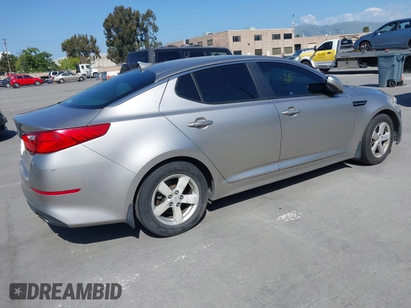 2014 Kia Optima LX with VIN KNAGM4A70E5482966, listed as a IAAI auction lot 42109539 with 194,519 mi miles and . Bid and sale history available at carsss.com. Image 4.