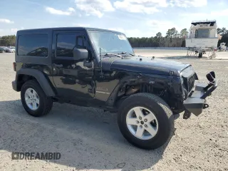 2014 Jeep Wrangler Sport with VIN 1C4AJWAG4EL233014, listed as a Copart auction lot 49868955 with 190,623 mi miles and Salvage Title. Bid and sale history available at carsss.com. Image 4.