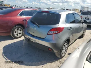 2014 Mazda 2 Sport with VIN JM1DE1KY6E0189739, listed as a Copart auction lot 76468914 with 107,164 mi miles and Salvage Title. Bid and sale history available at carsss.com. Image 3.