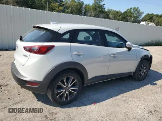 2018 Mazda CX-3 Touring with VIN JM1DKDC75J0329502, listed as a Copart auction lot 68061054 with 92,238 mi miles and Salvage Title. Bid and sale history available at carsss.com. Image 3.