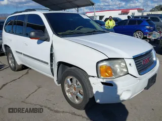 2002 GMC Envoy SLT with VIN 1GKDS13S522216498, listed as a IAAI auction lot 41642757 with 164,981 mi miles. Bid and sale history available at carsss.com. Image 1.