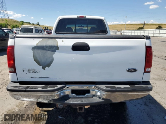 2000 Ford F-350 XL with VIN 3FTSW31F9YMA56877, listed as a Copart auction lot 62733624 with 120,595 mi miles and Salvage Title. Bid and sale history available at DreamBid. Image 6.