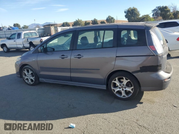 2009 Mazda 5 Sport with VIN JM1CR29L290348021, listed as a Copart auction lot 75912434 with 84,022 mi miles and Salvage title. Bid and sale history available at DreamBid. Image 2.