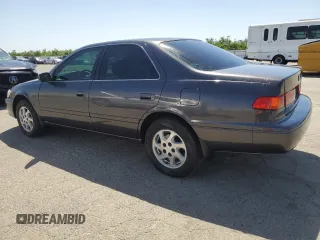 2001 Toyota Camry LE z VIN JT2BF22K010329017, wystawiony jako Copart lot #56035725 z przebiegiem 200 841 mil mil oraz Szkoda całkowita • Salvage title. Historia ofert i sprzedaży dostępna na DreamBid. Obrazek 2.