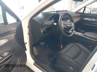 2025 Genesis GV70 2.5T z VIN 5NMMADTB9SH025307, wystawiony jako IAAI lot #42454804 z przebiegiem 20 799 mil mil oraz . Historia ofert i sprzedaży dostępna na DreamBid. Obrazek 20.