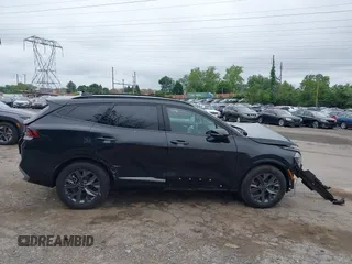 2023 Kia Sportage SX-Prestige with VIN KNDPXCAG3P7077955, listed as a IAAI auction lot 42456463 with 24,699 mi miles and . Bid and sale history available at DreamBid. Image 12.