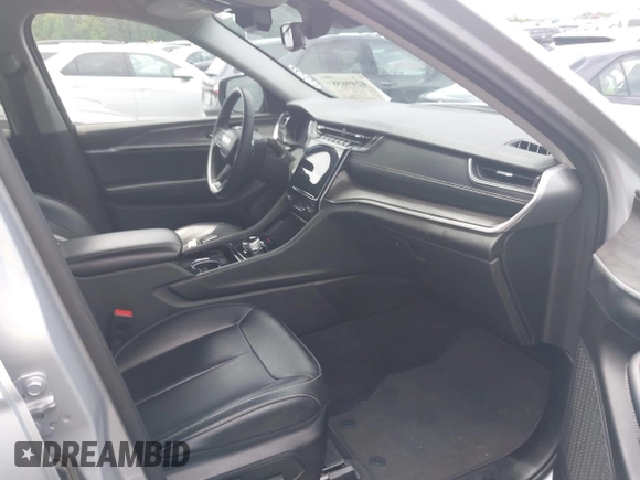 2023 Jeep Grand Cherokee Limited z VIN 1C4RJGBG1PC587289, wystawiony jako IAAI lot #42496587 z przebiegiem 75 292 mil mil oraz . Historia ofert i sprzedaży dostępna na DreamBid. Obrazek 5.