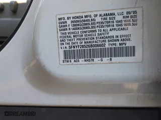 2006 Honda Pilot EX-L with VIN 5FNYF28526B006602, listed as a IAAI auction lot 41212862 with 239,648 mi miles. Bid and sale history available at carsss.com. Image 9.