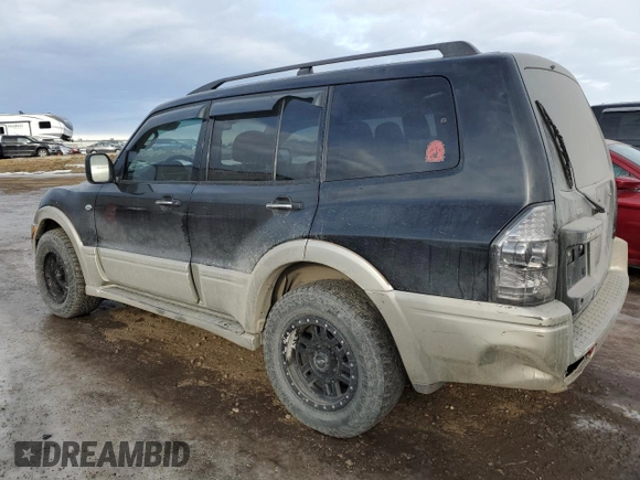 2003 Mitsubishi Montero z VIN JA4NW31SX3J600944, wystawiony jako Copart lot #87611305 z przebiegiem 215 693 mil mil oraz Czysty tytuł • Clean title. Historia ofert i sprzedaży dostępna na DreamBid. Obrazek 2.
