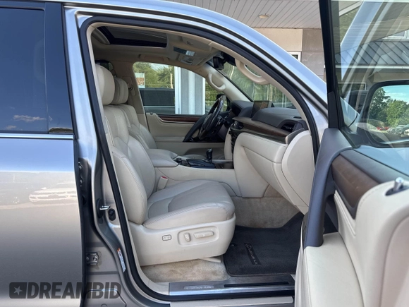2016 Lexus LX 570 with VIN JTJHY7AX4G4198811, listed as a IAAI auction lot 42702619 with 107,759 mi miles and . Bid and sale history available at DreamBid. Image 5.