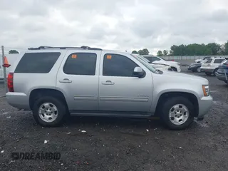 2012 Chevrolet Tahoe LS z VIN 1GNSCAE02CR308972, wystawiony jako IAAI lot #42495520 z przebiegiem 205 295 mil mil oraz . Historia ofert i sprzedaży dostępna na DreamBid. Obrazek 13.