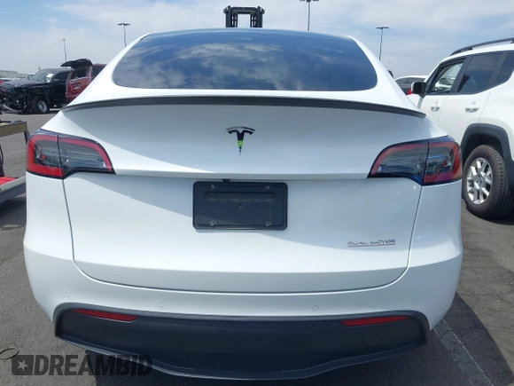 2022 Tesla Model Y Performance with VIN 7SAYGDEF8NF407109, listed as a IAAI auction lot 42014282 with 24,937 mi miles and . Bid and sale history available at DreamBid. Image 16.