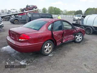 2004 Ford Taurus SES with VIN 1FAFP55284G188993, listed as a IAAI auction lot 41895733 with Not Provided miles and . Bid and sale history available at DreamBid. Image 4.