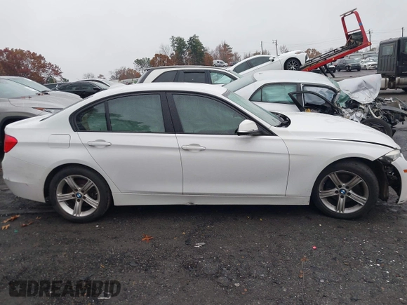 2015 BMW 3 Series 320i with VIN WBA3B1C51FP831380, listed as a IAAI auction lot 41044053 with 187,660 mi miles. Bid and sale history available at carsss.com. Image 13.