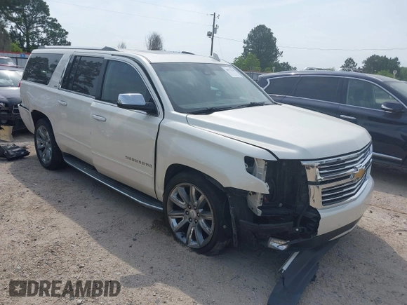 2015 Chevrolet Suburban LTZ with VIN 1GNSCKKC5FR740352, listed as a IAAI auction lot 39075234 with 112,945 mi miles and . Bid and sale history available at DreamBid. Image 1.